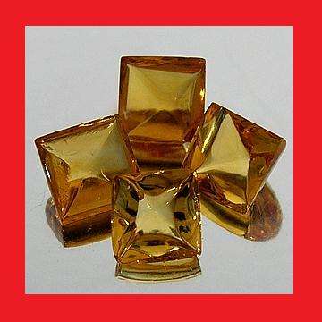 CITRINE -  IMPERIAL YELLOW TETRAHEDRON FACET - 0.73cts