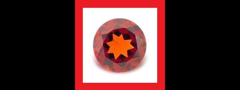 GARNET - ORANGE RED ROUND FACET - 0.17cts