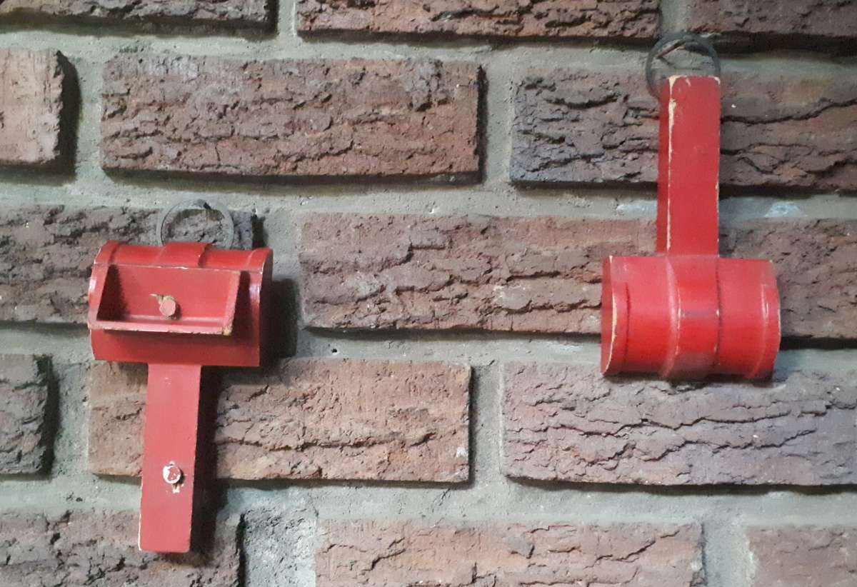 Red hanging mallet shapes