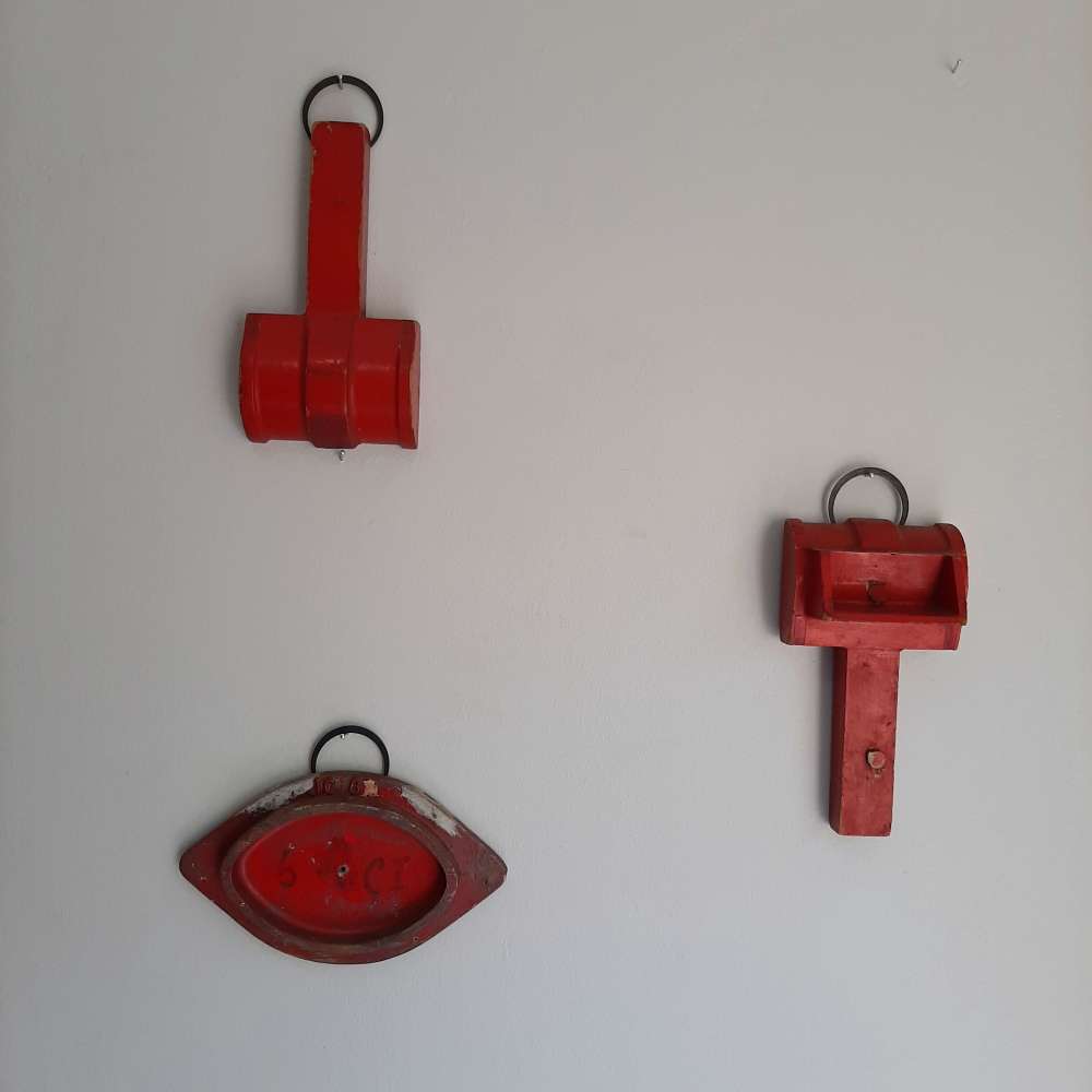 Red hanging mallet shapes