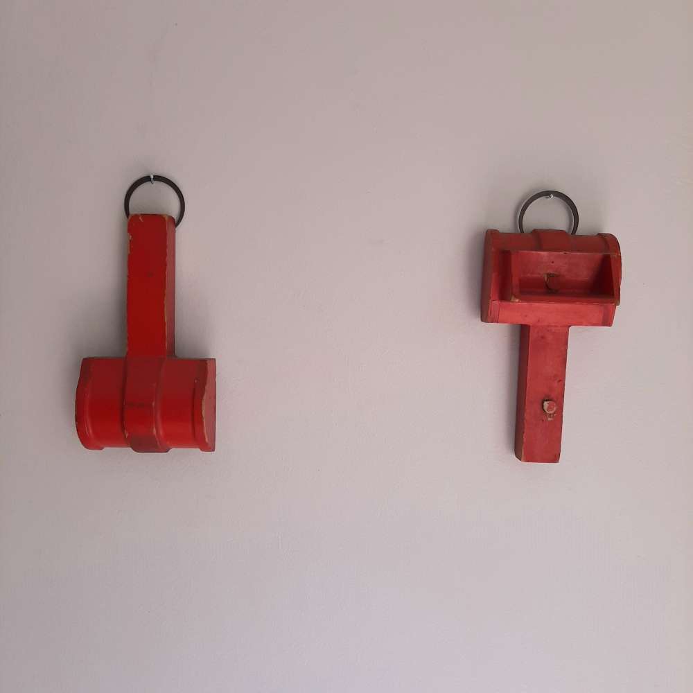 Red hanging mallet shapes
