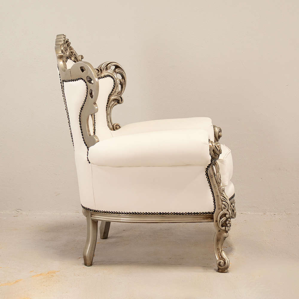 Carved Leather Armchairs