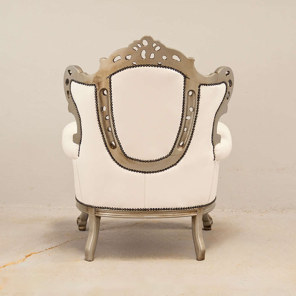 Carved Leather Armchairs