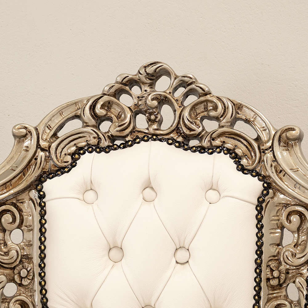 Carved Leather Armchairs