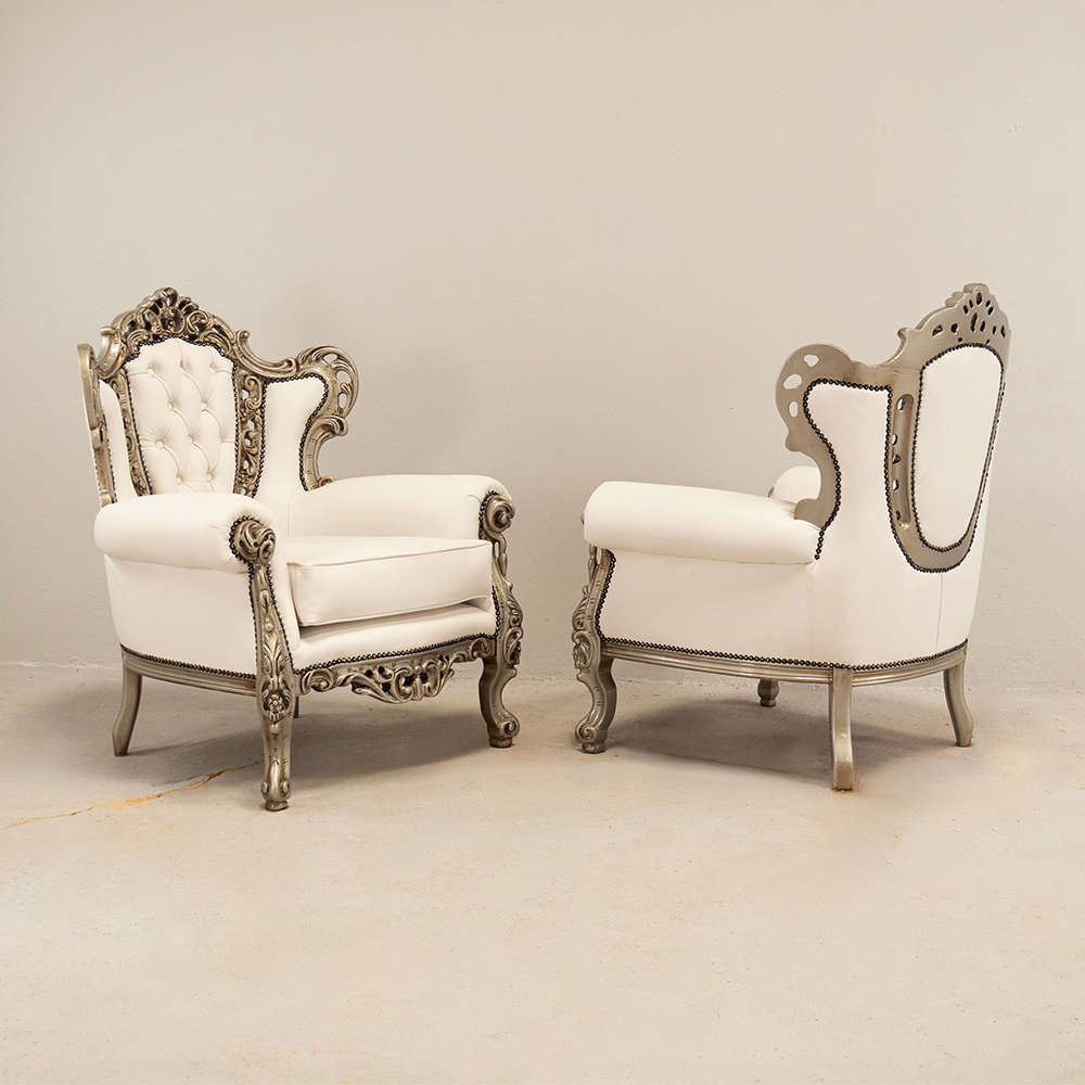 Carved Leather Armchairs