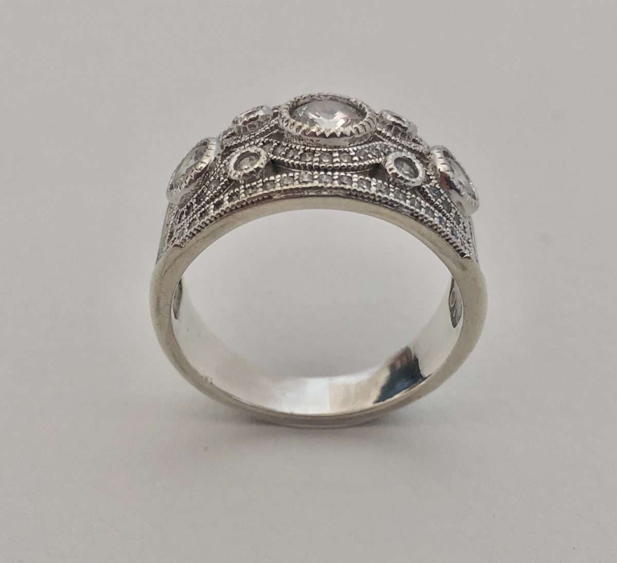 925 Silver Ring, Band with Stones surrounded by a twirly design filled with tiny diamante #ML555