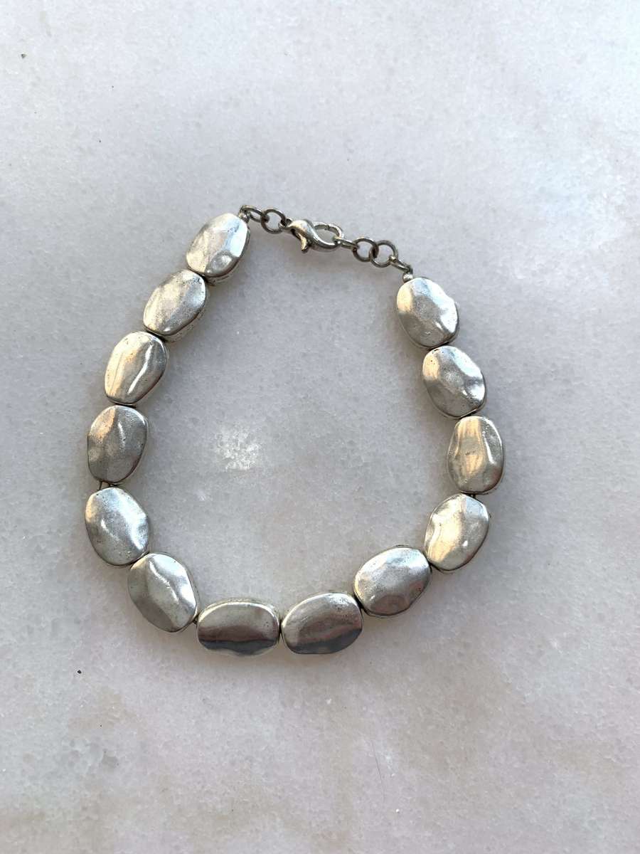 Silver Toned Bracelet With irregular Natural Oval Shaped Raised Disks #ML788 R120.00