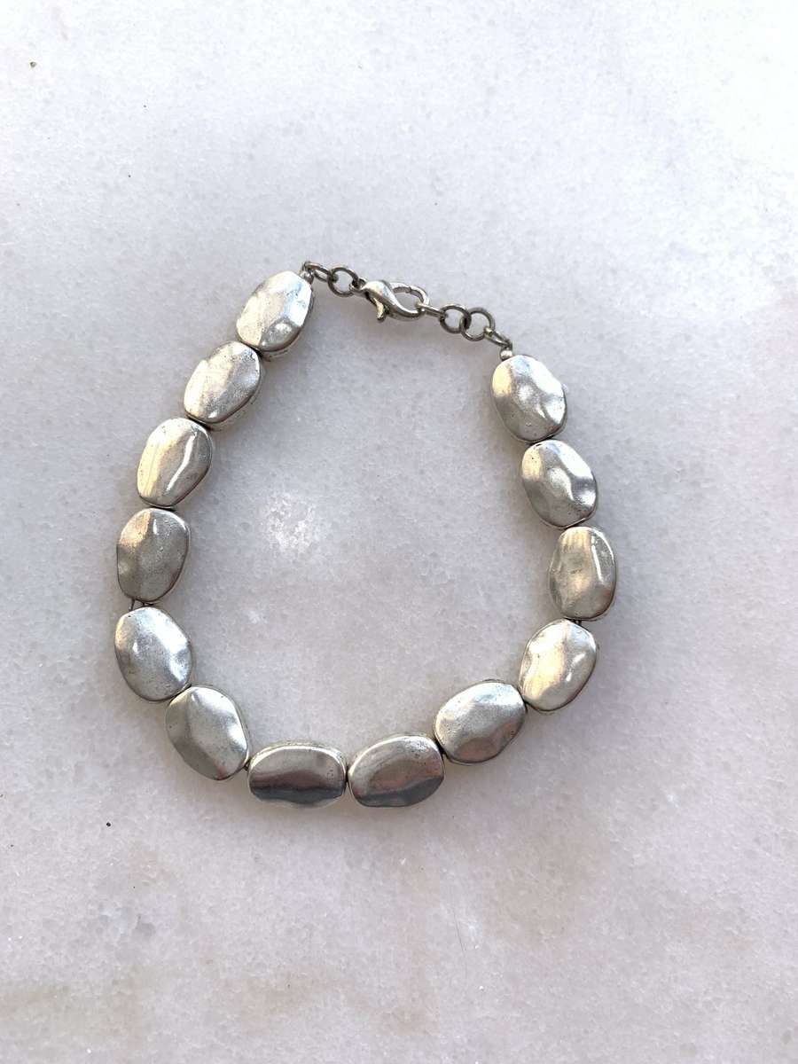 Silver Toned Bracelet With irregular Natural Oval Shaped Raised Disks #ML788 R120.00