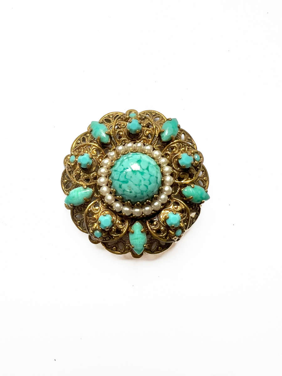 Brooch - Vintage Filigree Turquoise Design with small stones and large stone in the middle surrou...