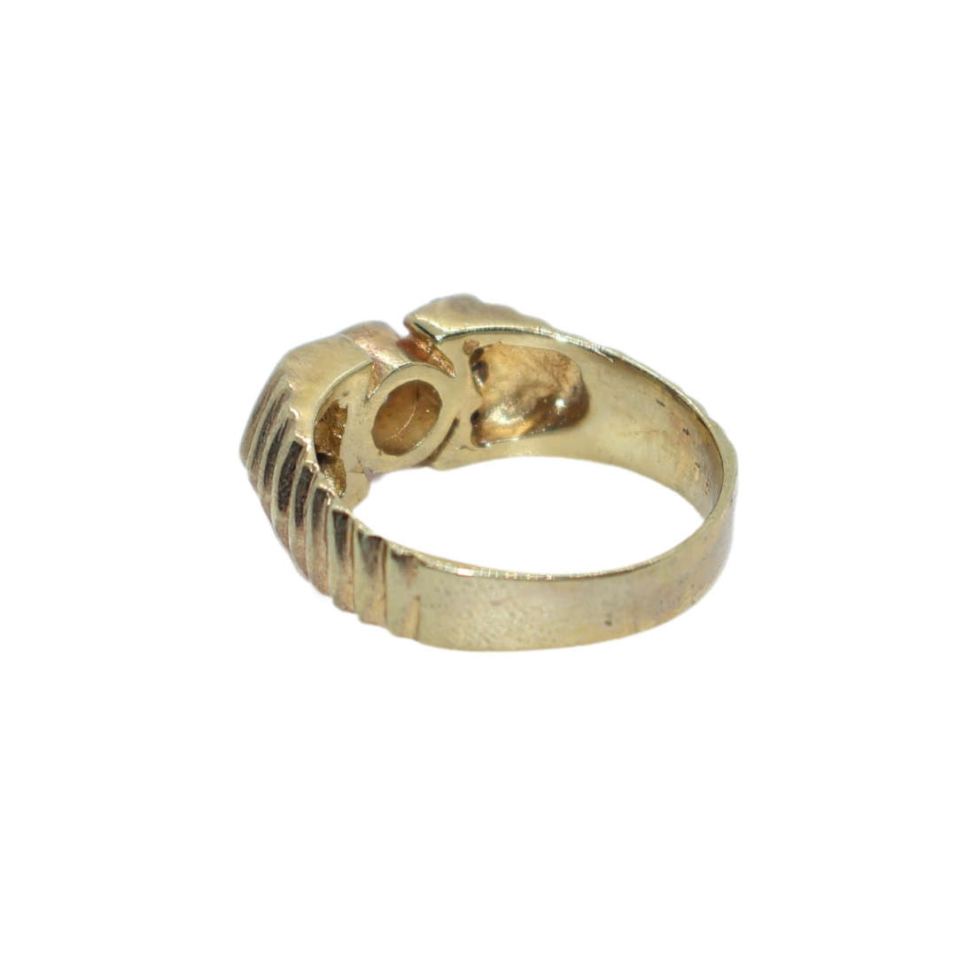Ring - Silver Gilt.  Patterned band/ centre clear stone small clear stones on either side - ML3639