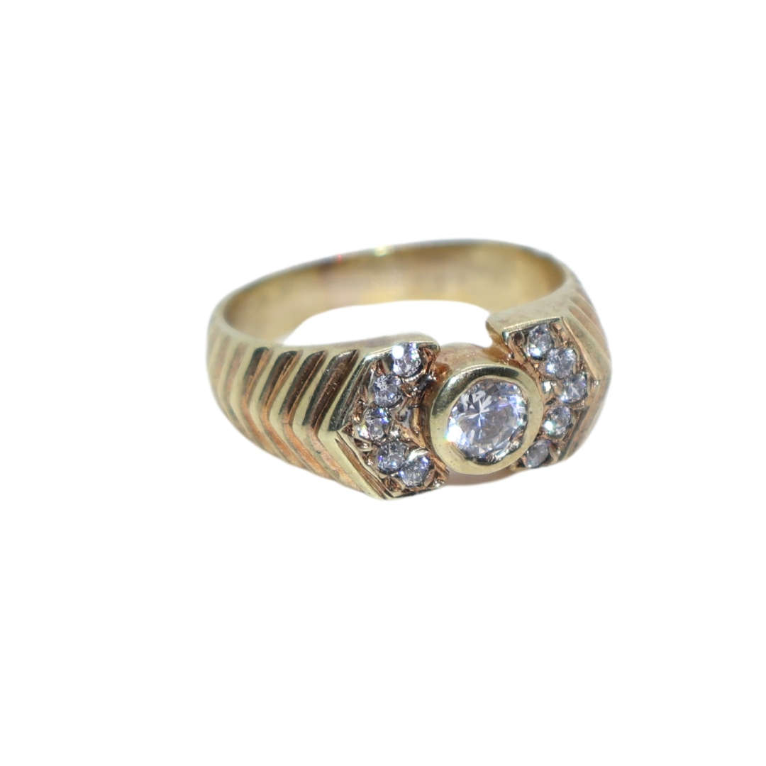 Ring - Silver Gilt.  Patterned band/ centre clear stone small clear stones on either side - ML3639