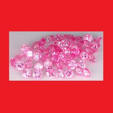 CUBIC ZIRCONIUM PARCEL OF 10 - PINK ICE ROUND FACET - 3.07cts
