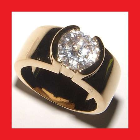 CUBIC ZIRCONIUM SOLITAIRE DRESS RING IN 18K YELLOW GP.