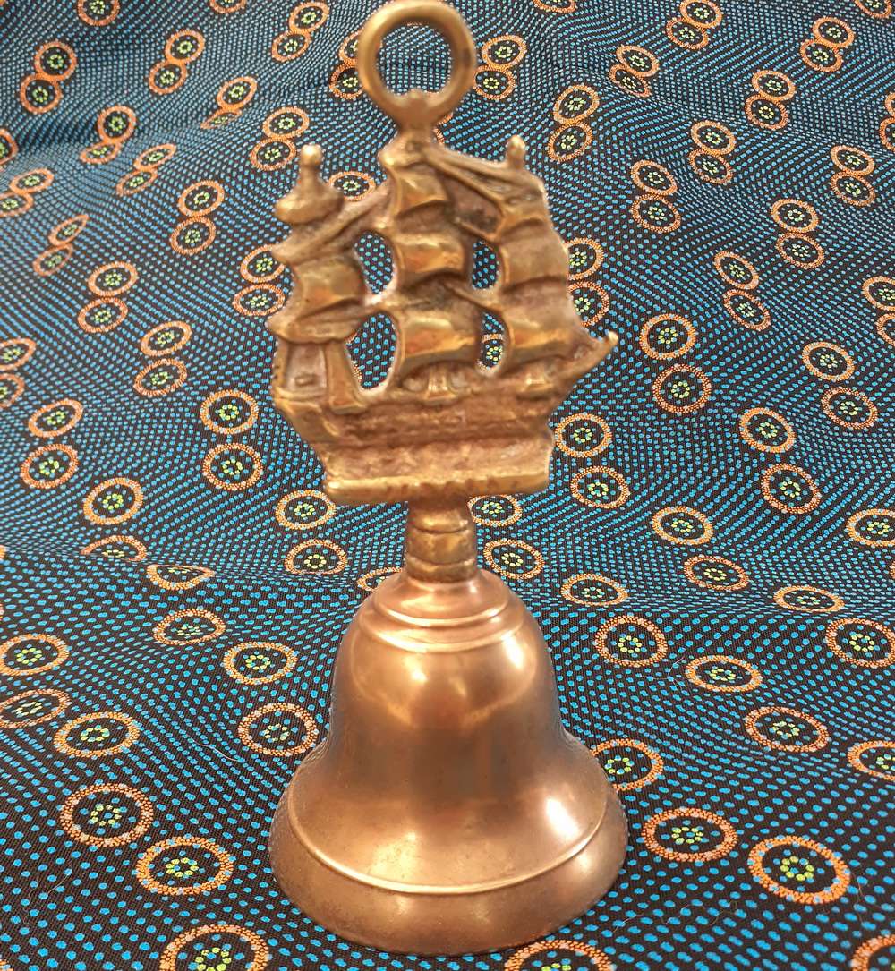 Brass bell with ship