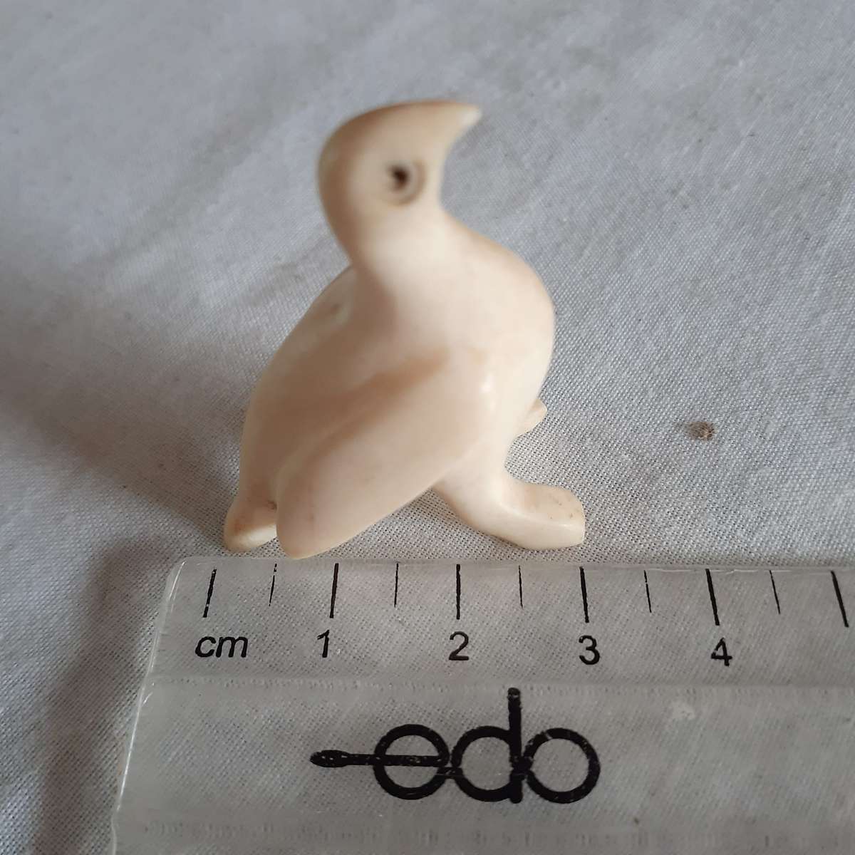 7 Little carved bone figurines birds and a crocodile