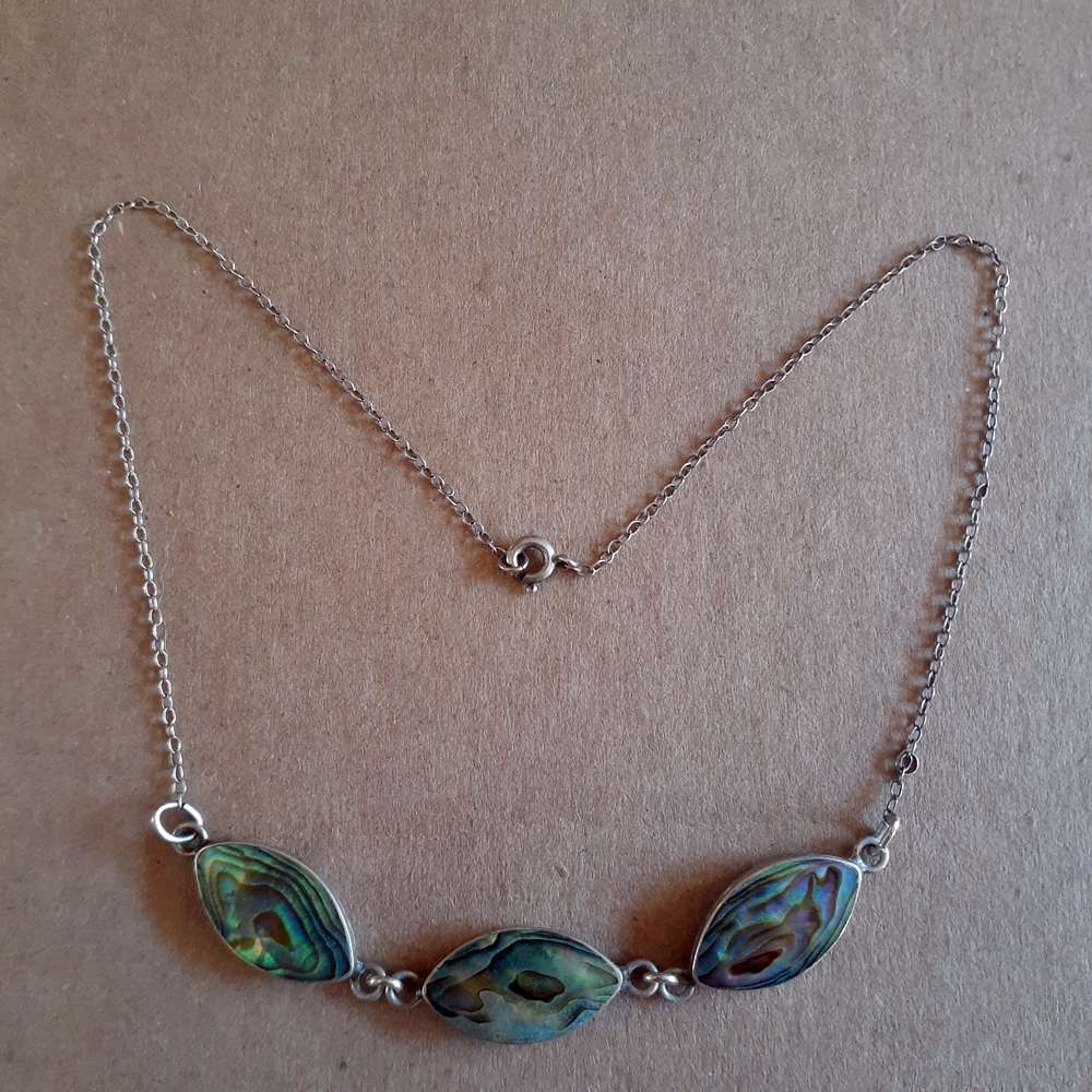 Stirling silver and pau shell choker necklace.   5.61gms