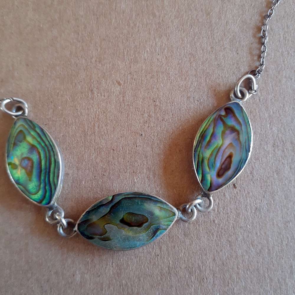 Stirling silver and pau shell choker necklace.   5.61gms