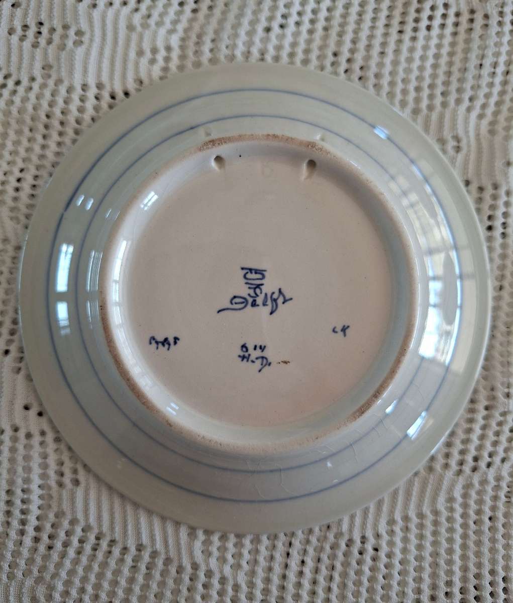 Delft wall plate - blue and white signed 14cms