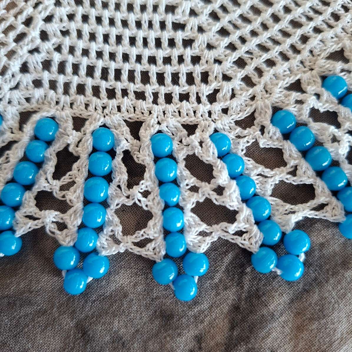 2 Crochet doilies jug covers with glass beads