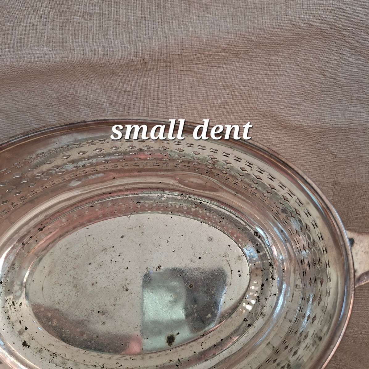 Silver plated fruit dish with two handles.   Walker and Hall.