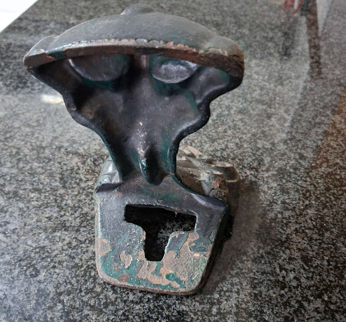 Old cast iron Door stop / leg from an antique bath.   Lions paw foot