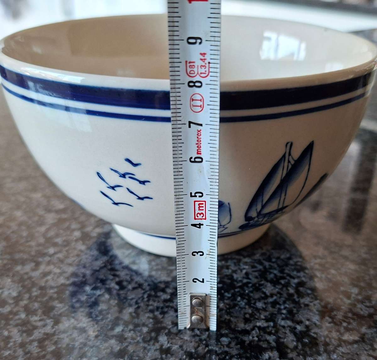 Blue and White Delft style bowl windmills and boats.