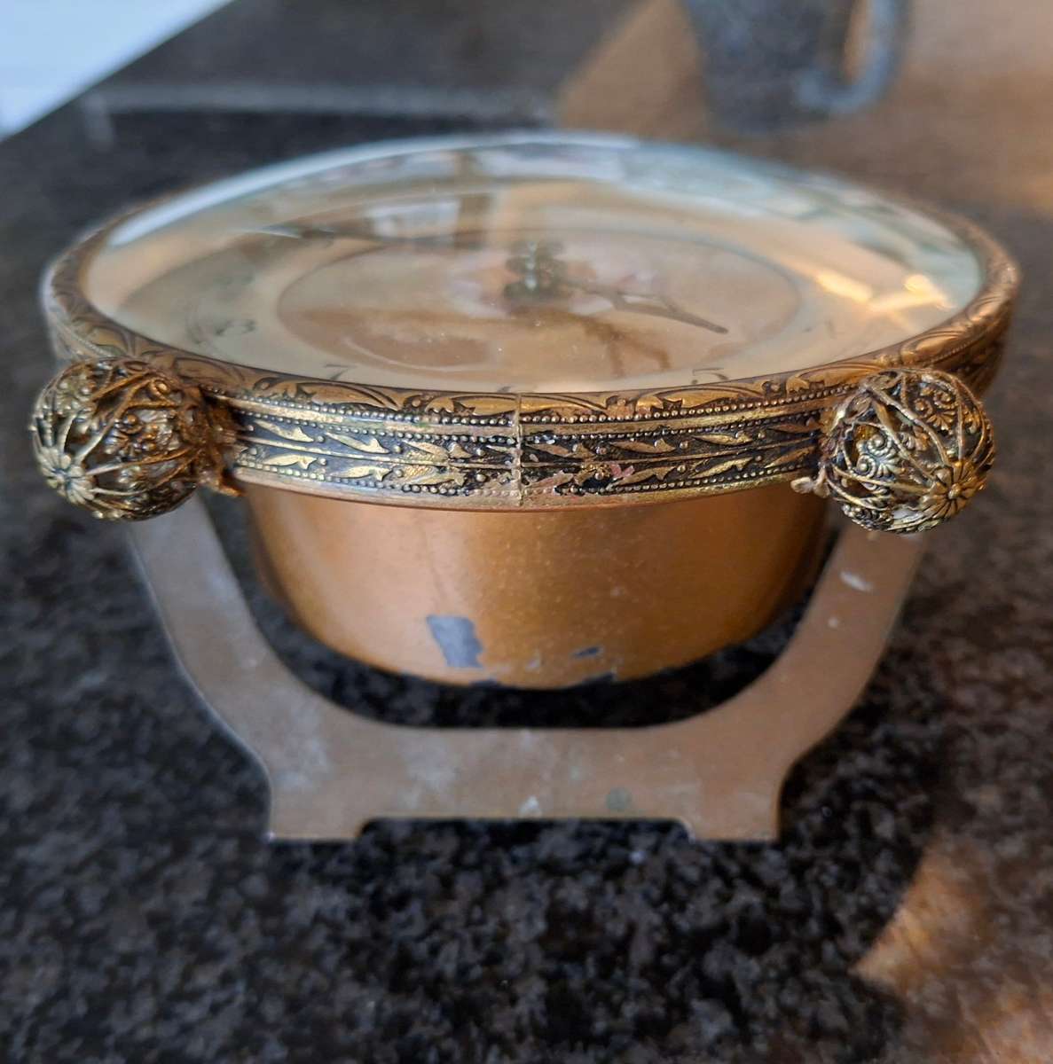 Mechanical Table Clock with petit point face - made in england.  Filigree metal feet.  Working