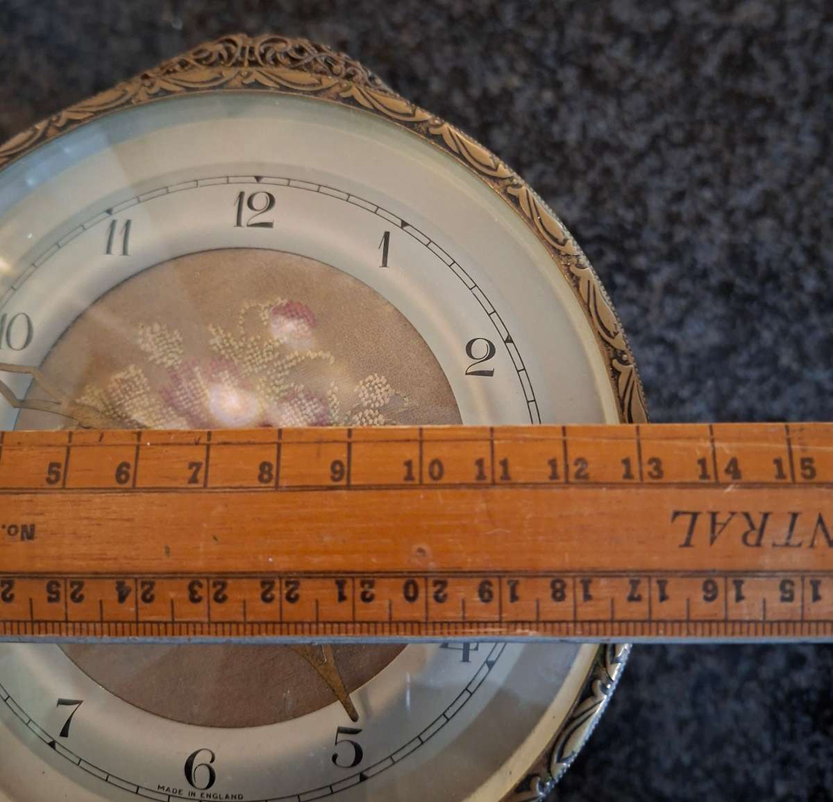 Mechanical Table Clock with petit point face - made in england.  Filigree metal feet.  Working