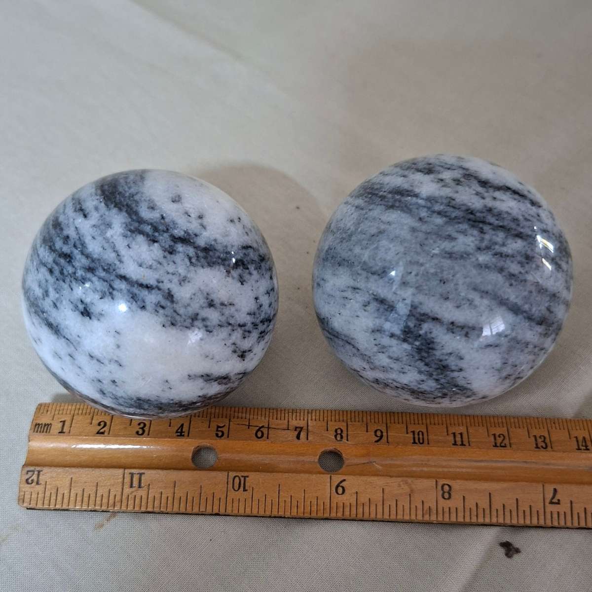 2 Polished marble decorative spheres, balls.