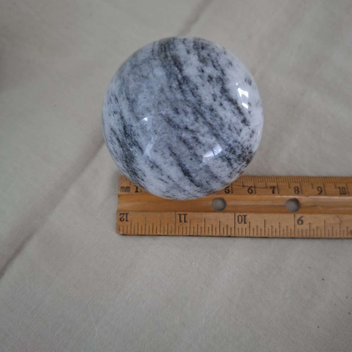 2 Polished marble decorative spheres, balls.