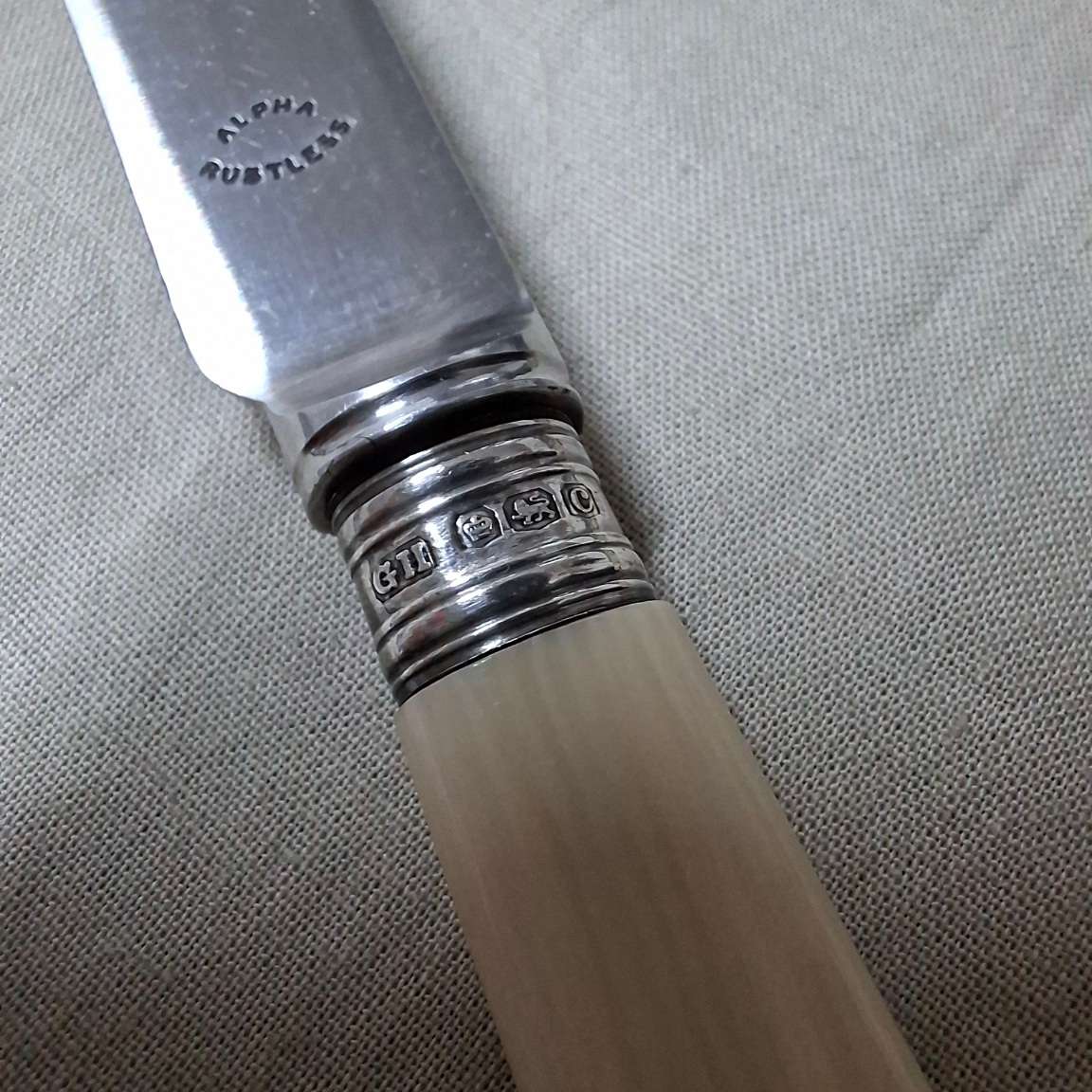 6 bone handled fruit knives with hallmarked silver collars