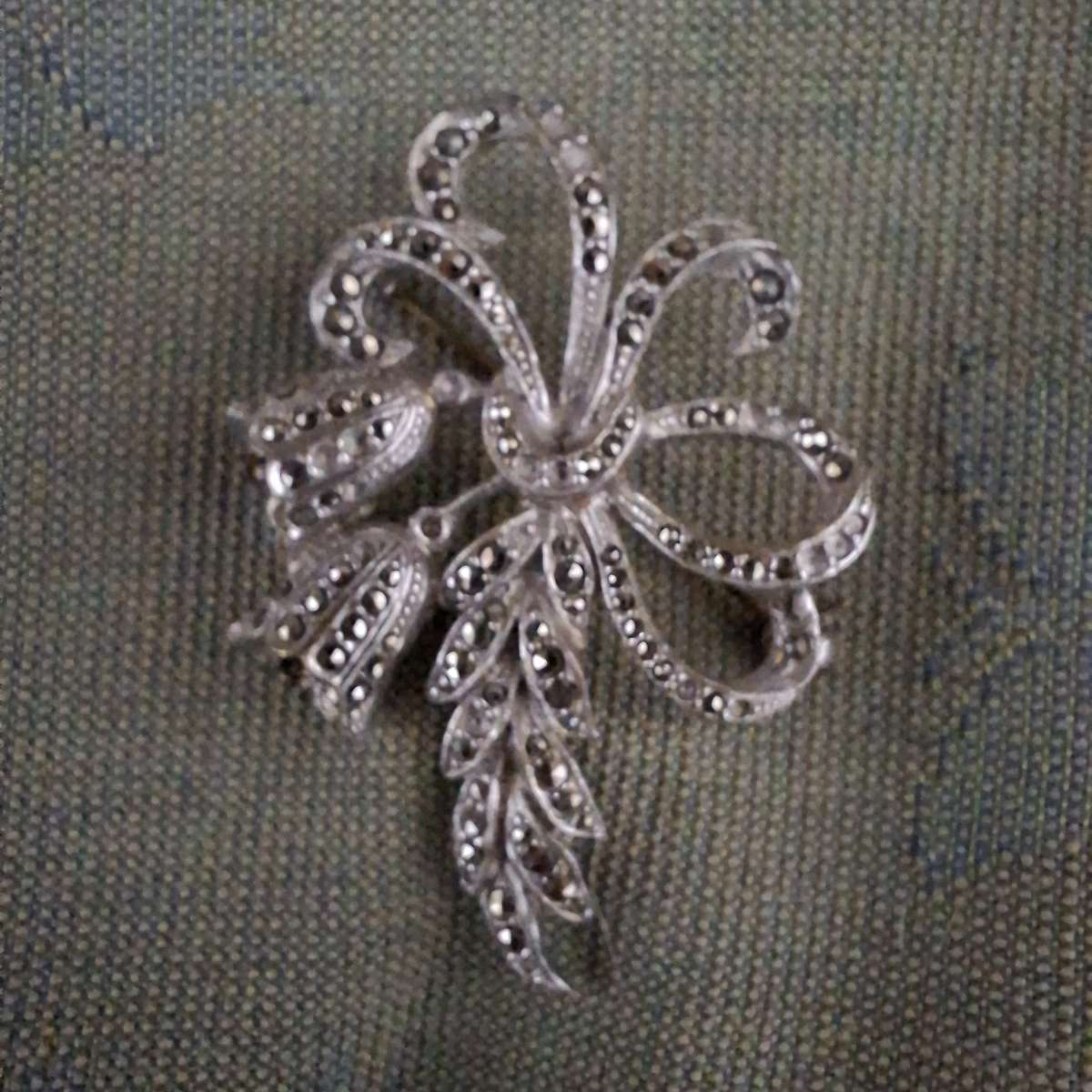 Two vintage brooches - real marcasite and rhinestones