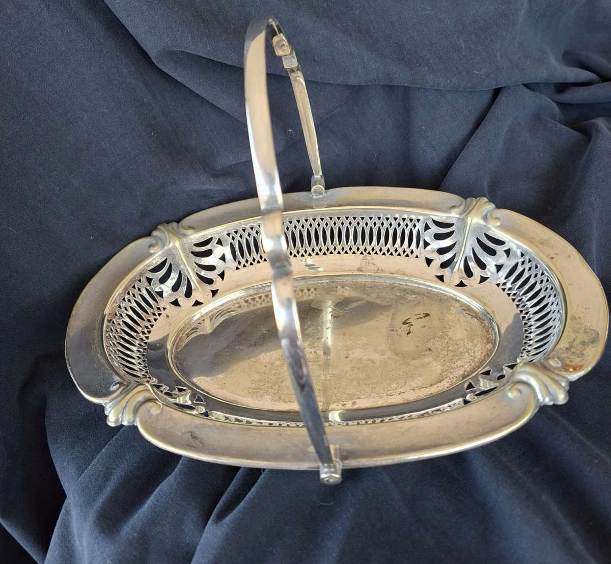 Silver electro plate pressed basket with handle.  Fruit biscuits bread.  Open work gallery rim