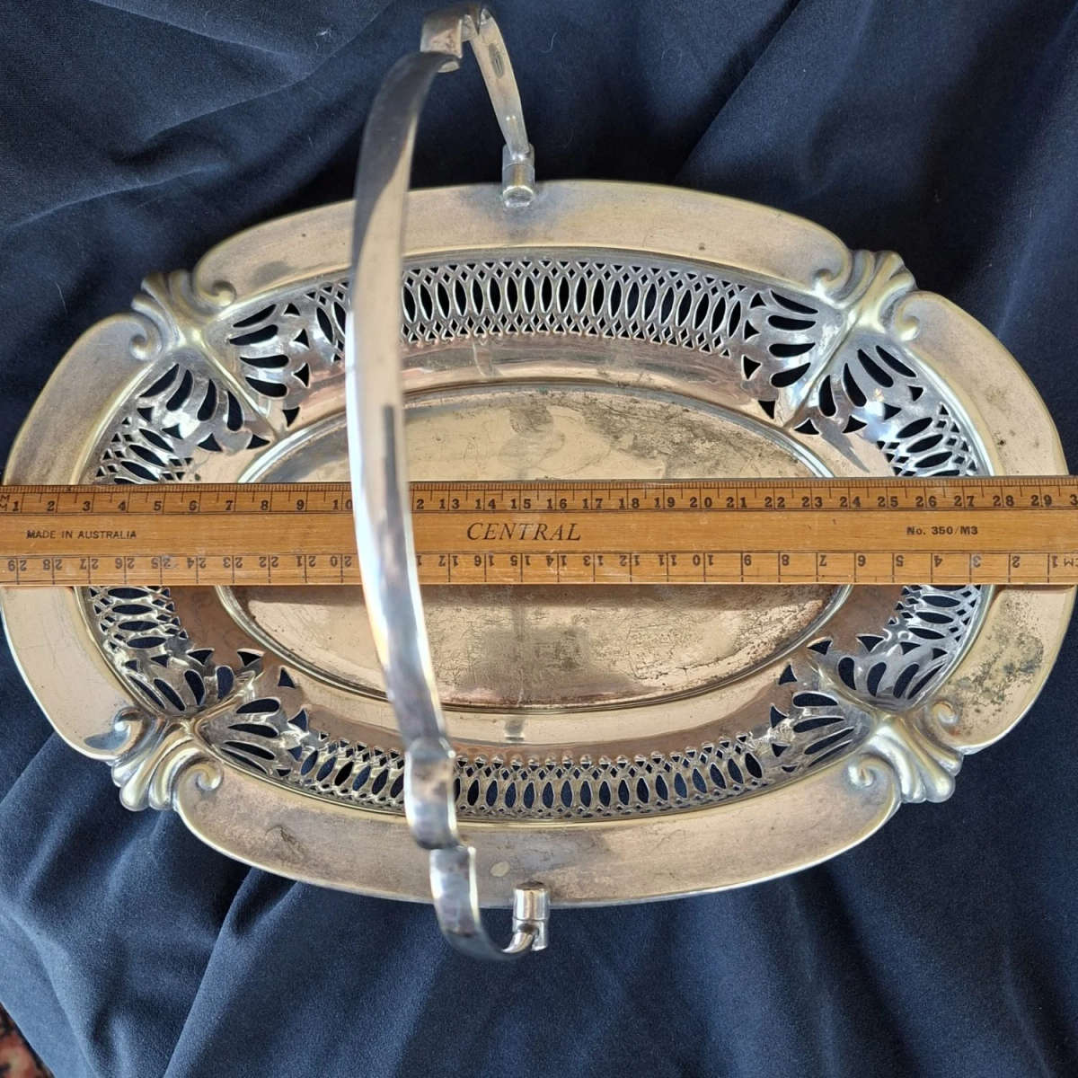 Silver electro plate pressed basket with handle.  Fruit biscuits bread.  Open work gallery rim