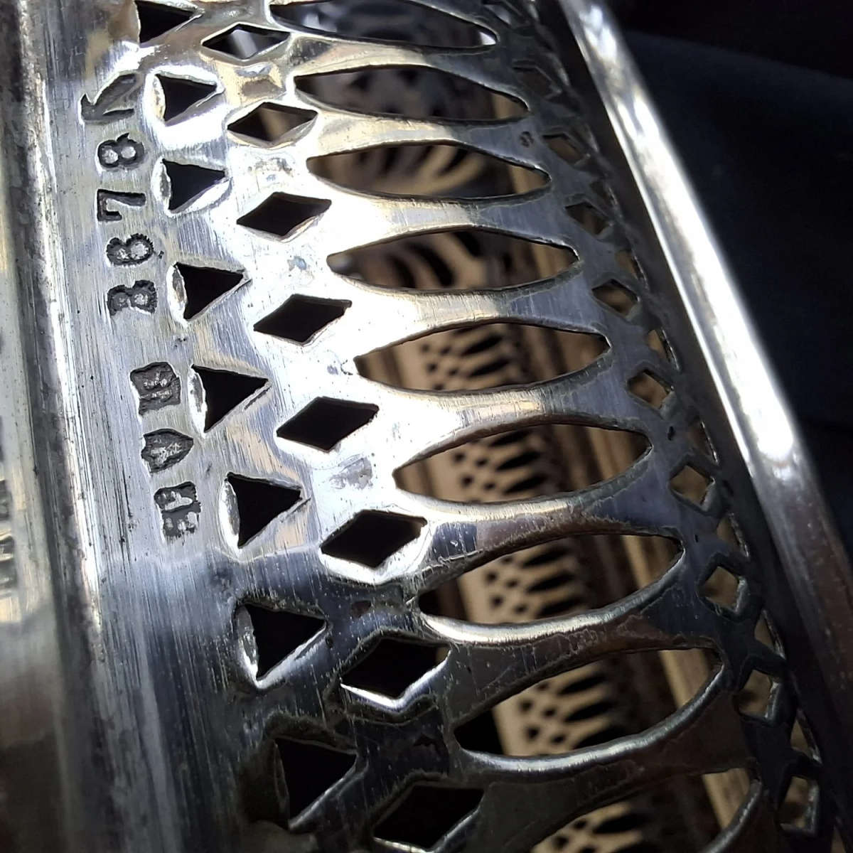 Silver electro plate pressed basket with handle.  Fruit biscuits bread.  Open work gallery rim