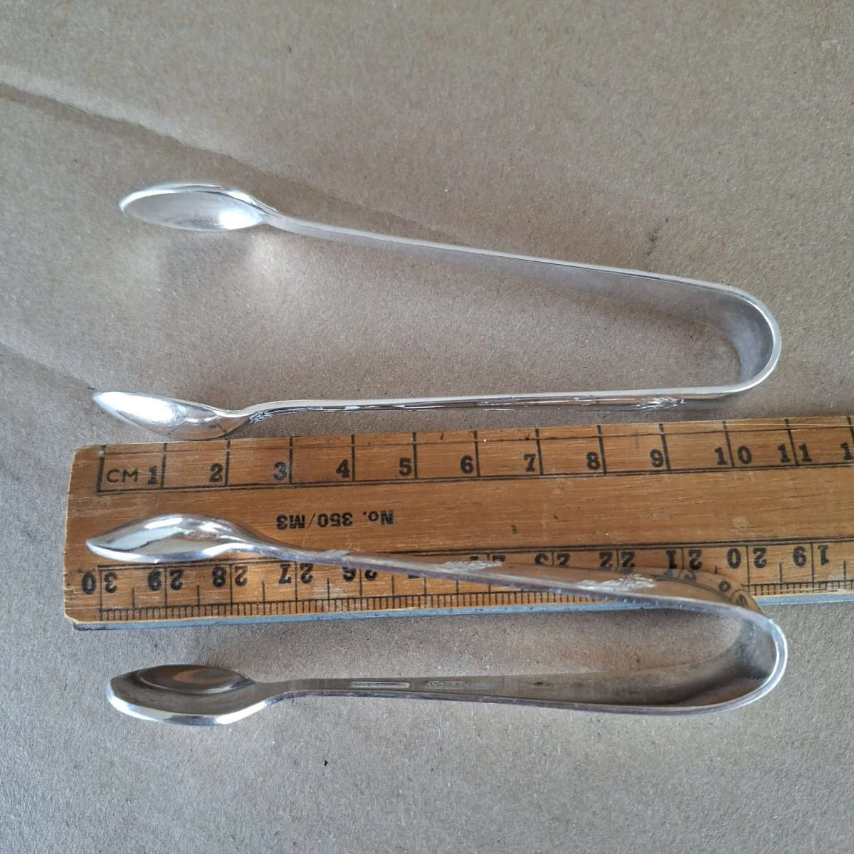 2 silver plate sugar tongs vintage