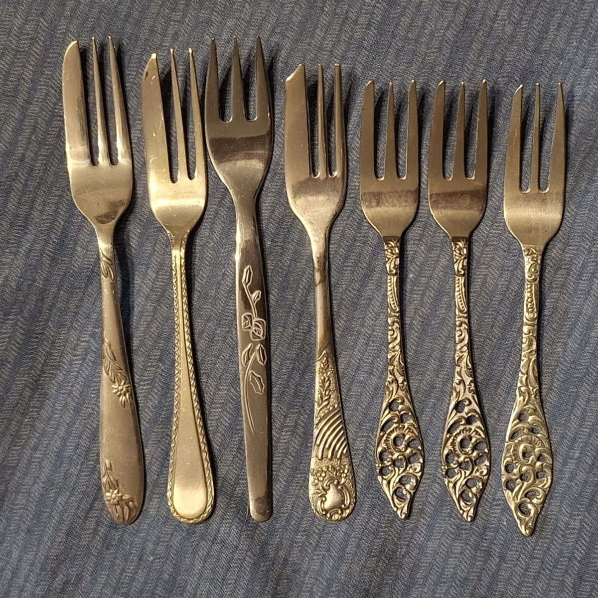 7 cake forks - different designs