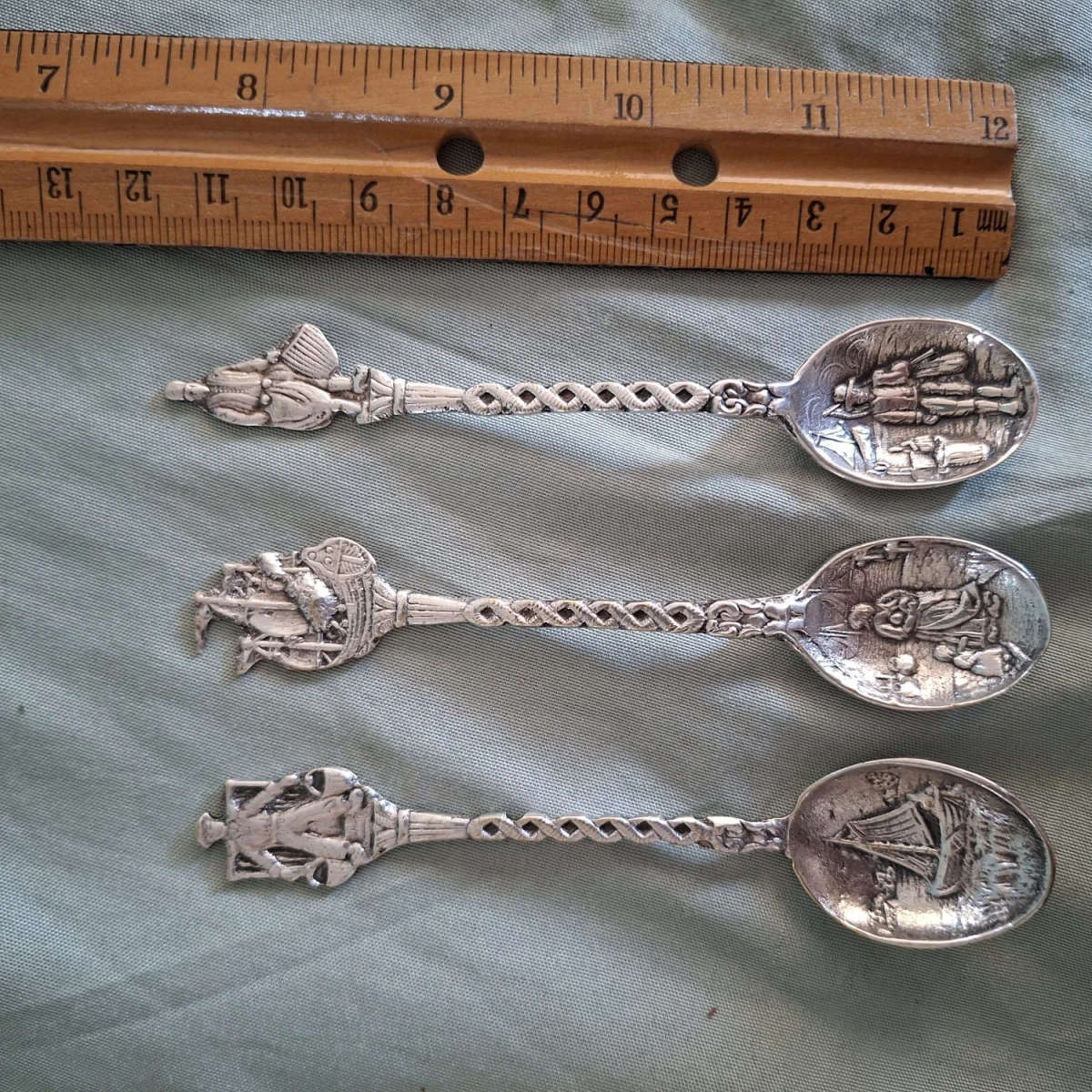 3 Dutch teaspoons - ornate with figurines