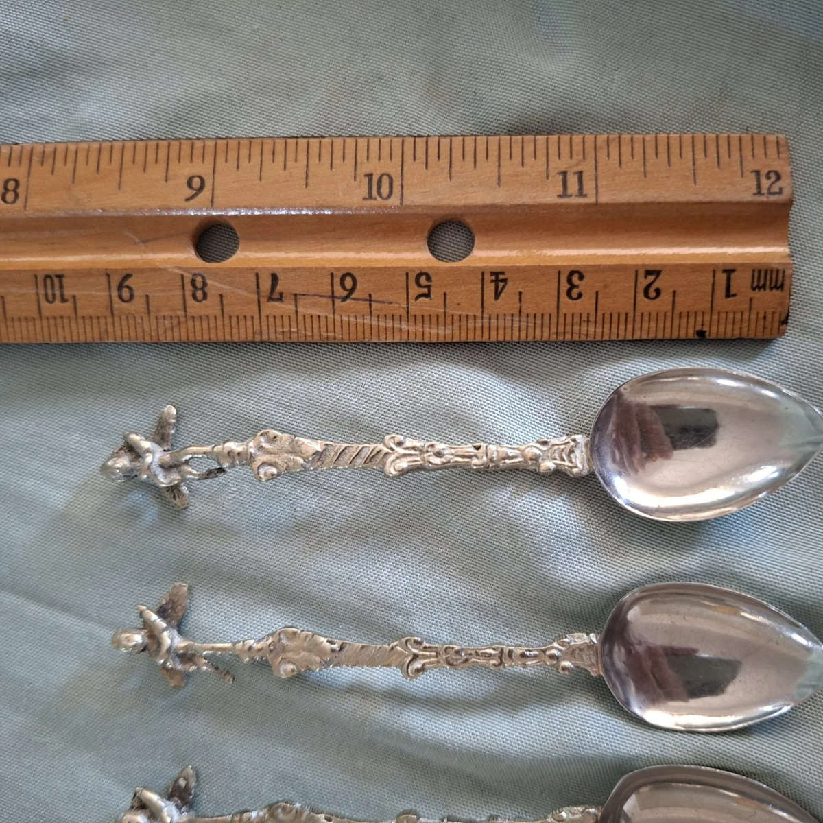 5 teaspoons ornate with cherubs angels