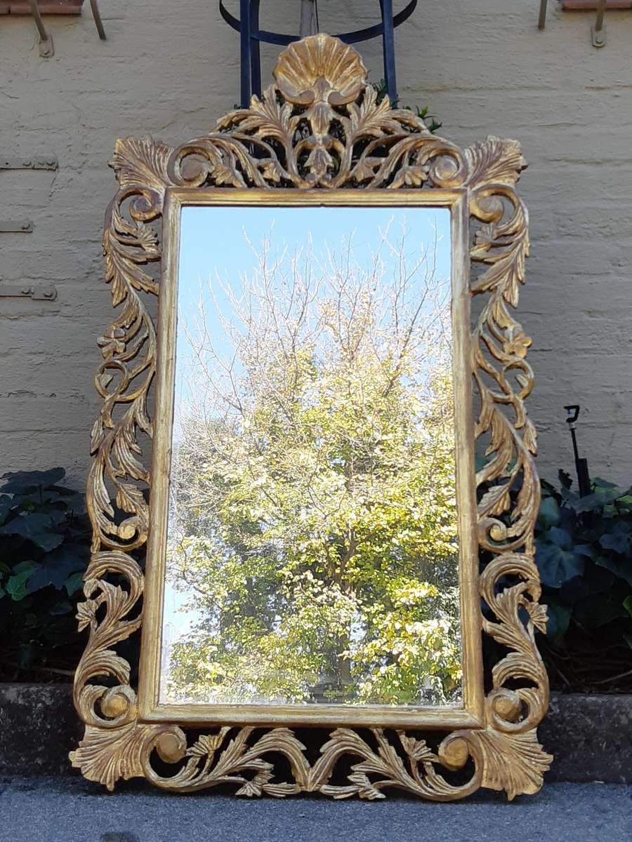 Ornate carved Mirror Gilded with  Gold Leaf
