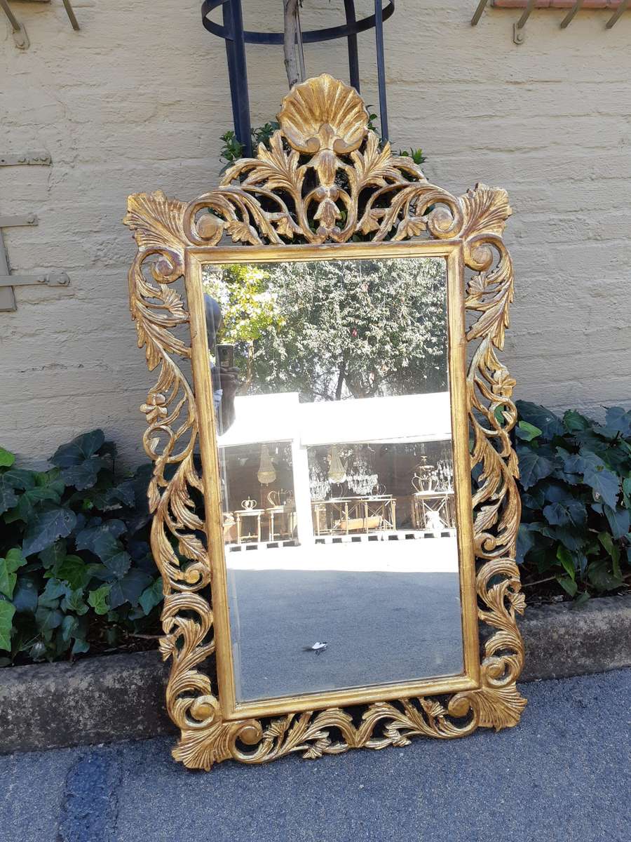 Ornate carved Mirror Gilded with  Gold Leaf