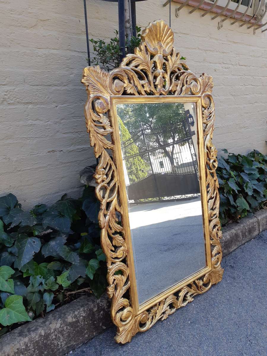 Ornate carved Mirror Gilded with  Gold Leaf
