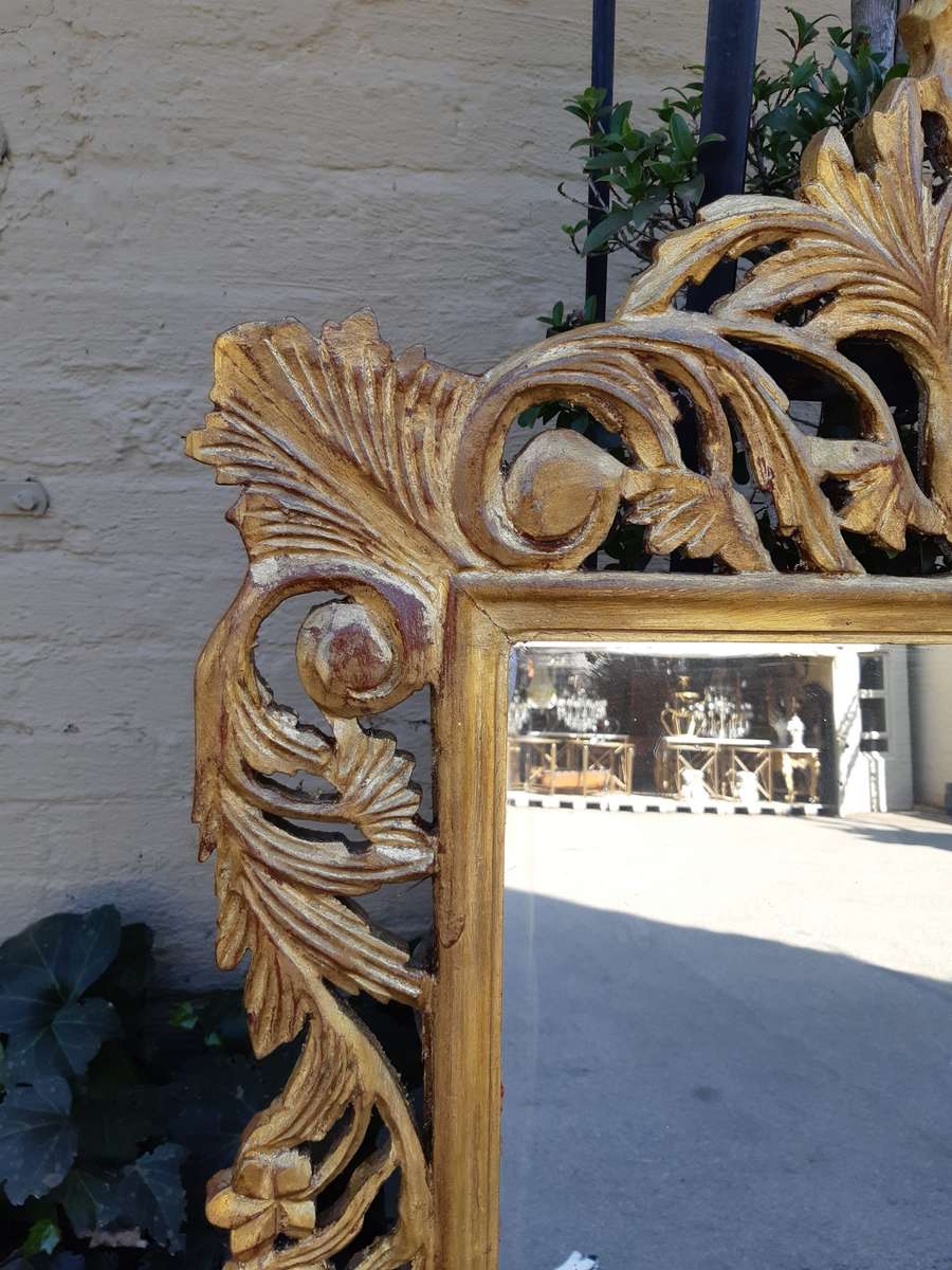Ornate carved Mirror Gilded with  Gold Leaf