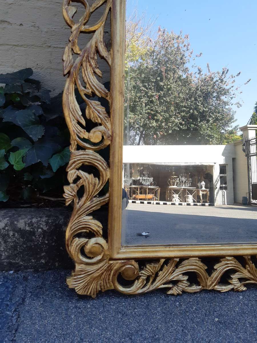 Ornate carved Mirror Gilded with  Gold Leaf
