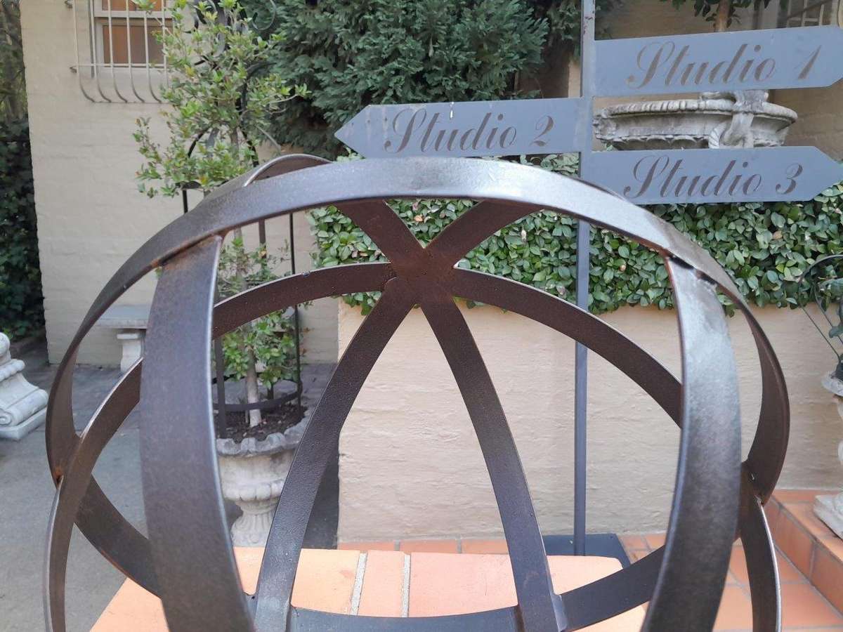 A Decorative Wrought Iron Ball in an Antique Brown Finish (Medium)