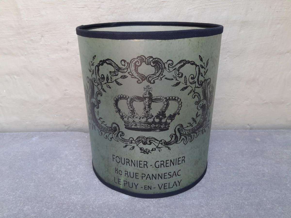 A Hand-Made Lampshade With Crest