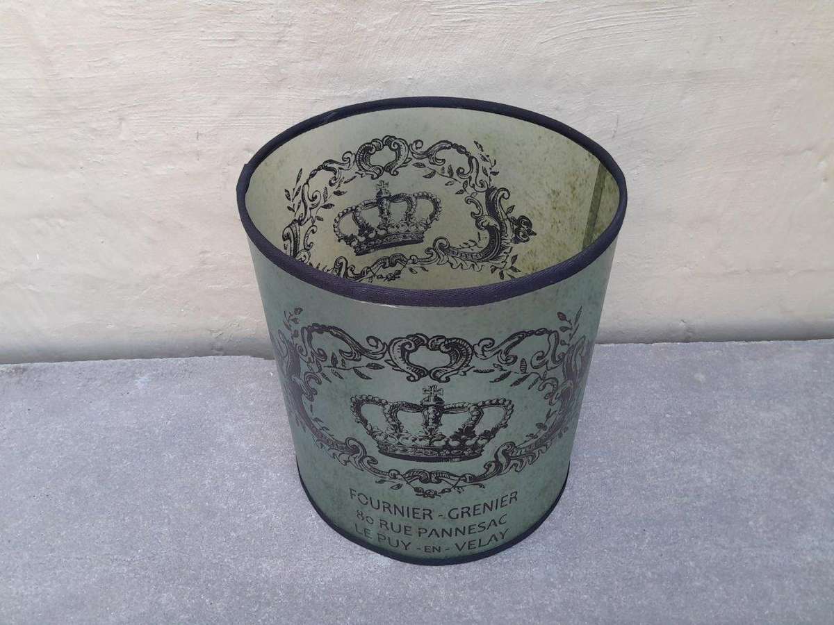 A Hand-Made Lampshade With Crest