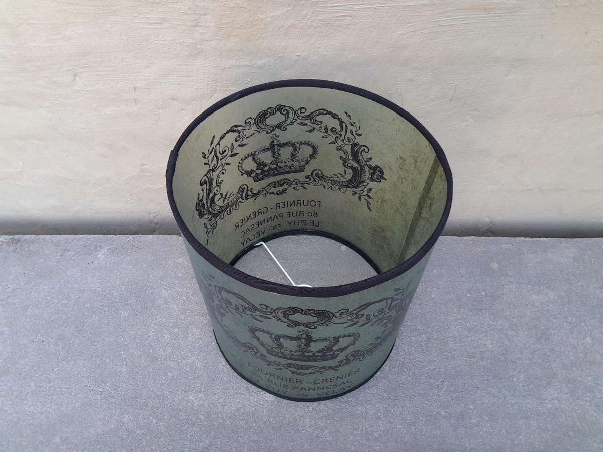 A Hand-Made Lampshade With Crest