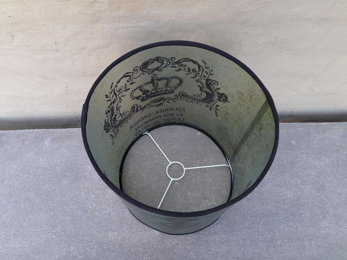 A Hand-Made Lampshade With Crest
