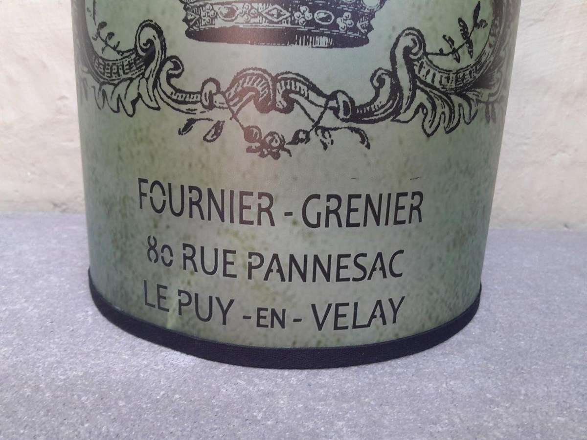 A Hand-Made Lampshade With Crest